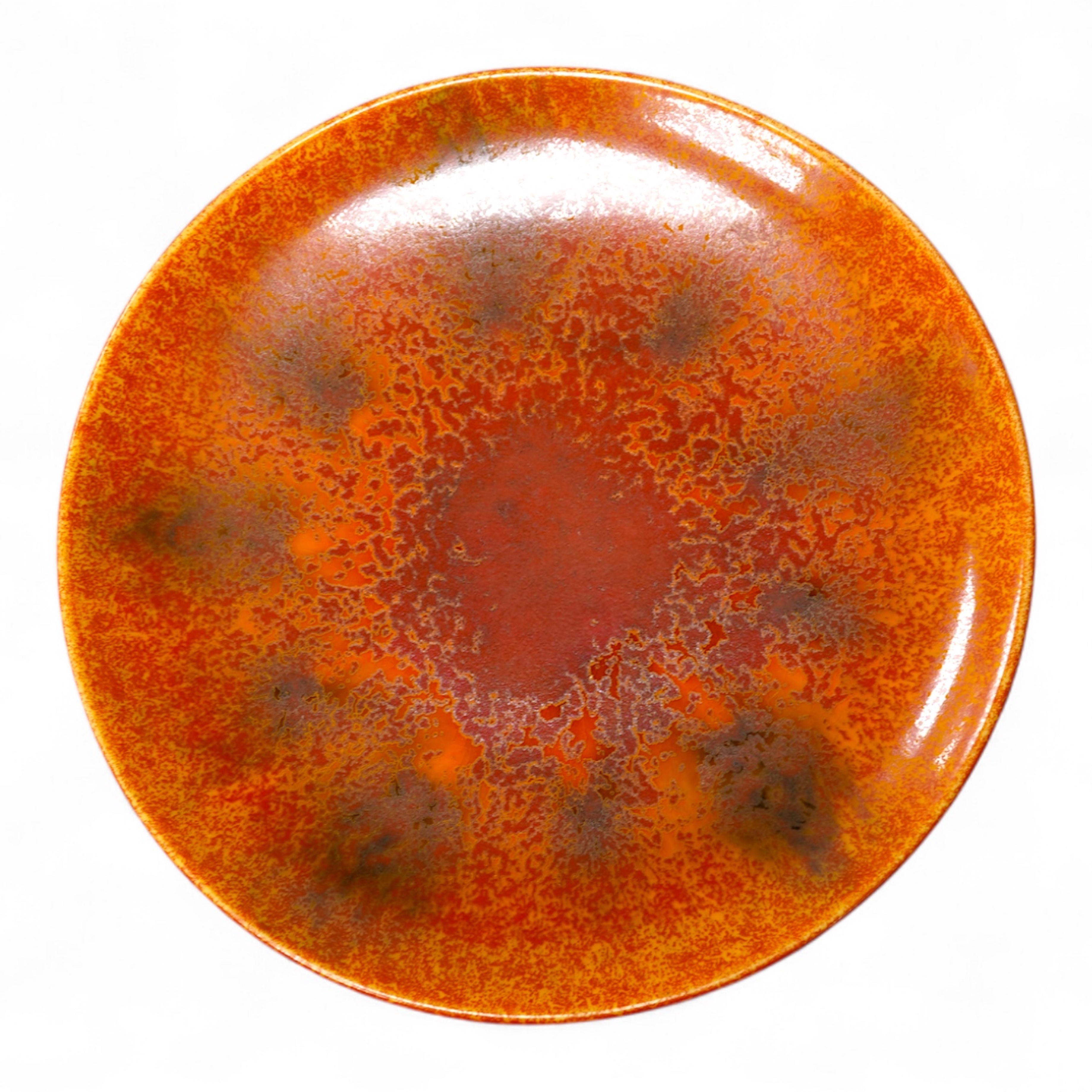 A Pilkingtons orange lustre plate, stamped to the base, 21cm in diameter